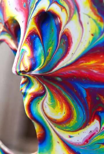 Eccentric art transforming into an African-American woman in a flowing gown