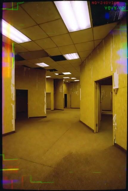 Video prompt for a terrifying liminal space in the style of the Backrooms