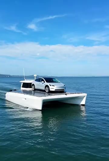 Video prompt for a solar-powered boat with a Tesla Model Y