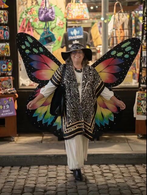 Woman Flying from Butterfly Bench
