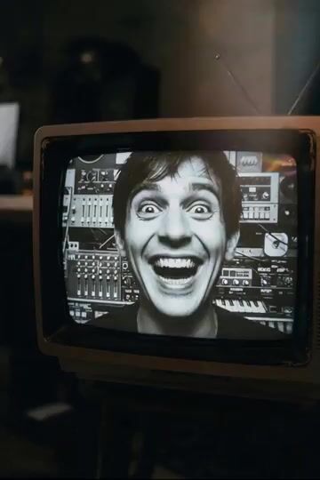 Man Laughing Inside Vintage TV