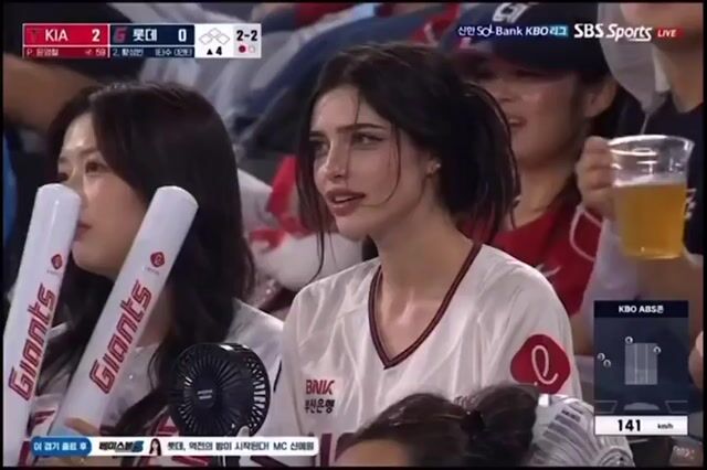 Pensive Fan at Baseball Game